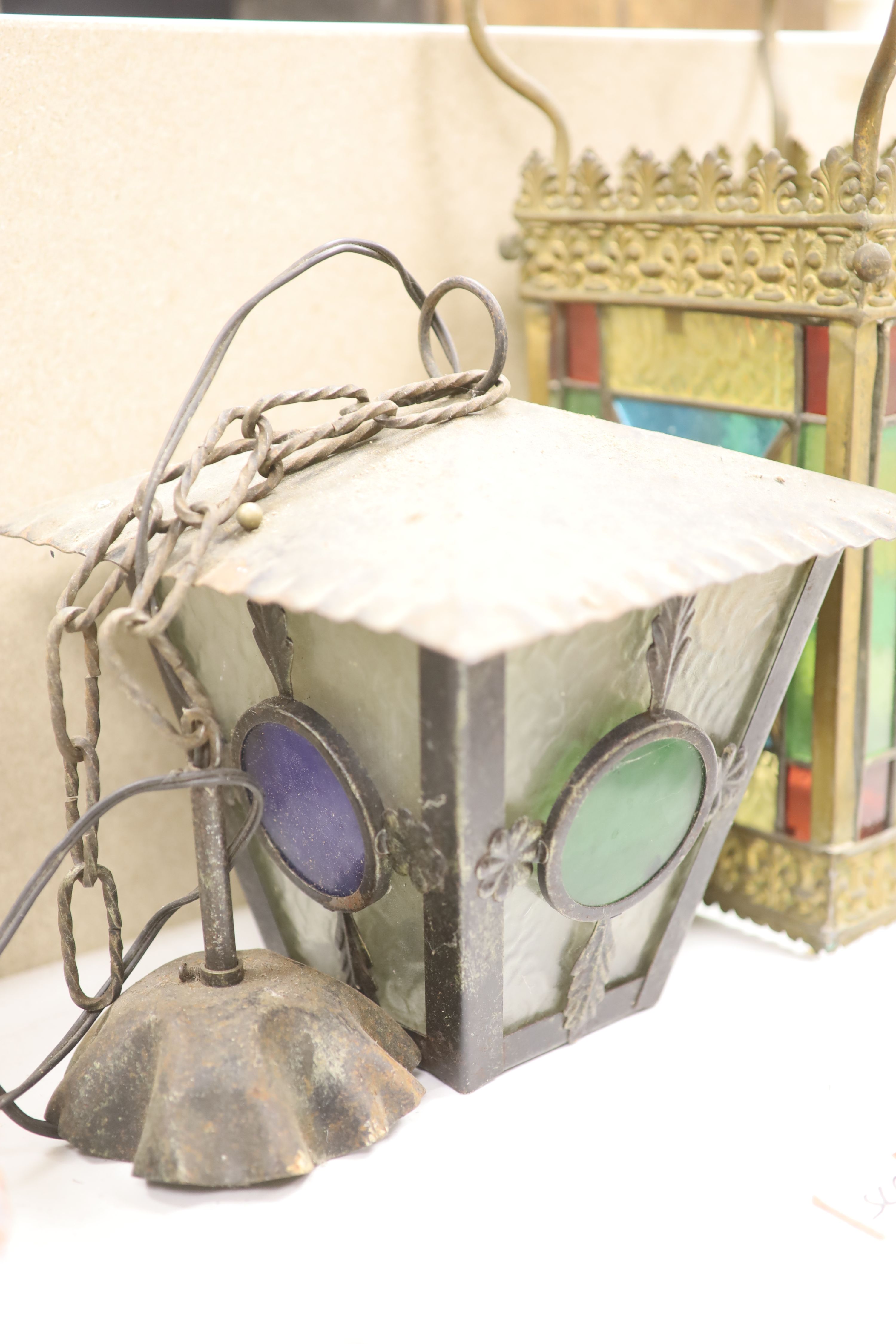 A hanging brass hall lantern and another, drop 50cm